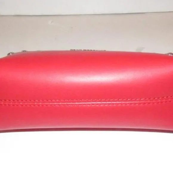 AMAZING, NWT, Moschino, true red leather, retro, clutch or cosmetic bag with chrome studs, a zip top closure, an XL engraved chrome zipper fob, and polished chrome hardware